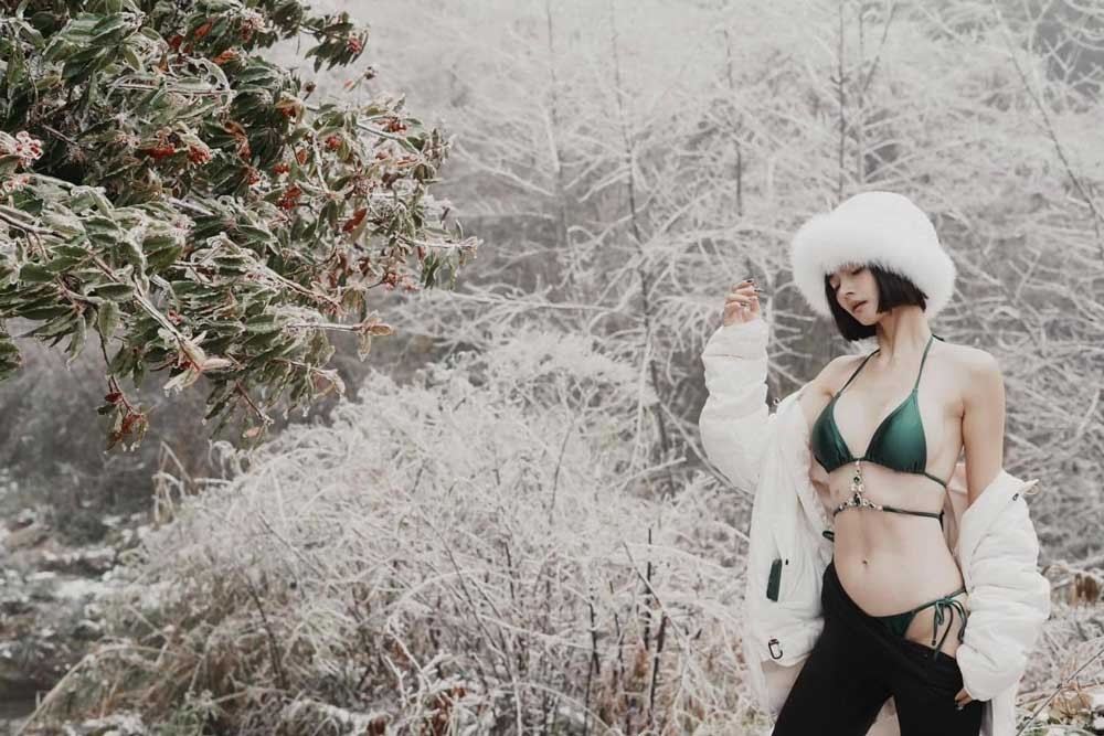 Hot girl gây tranh cãi khi đu trend check in thời tiết lạnh, vượt qua cả MC Phương Thảo