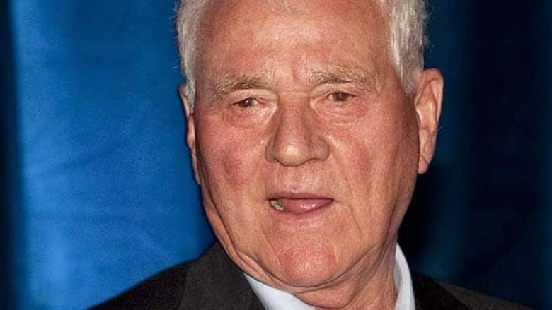 Canadian businessman Frank Stronach charged in sex assault probe | CBC News